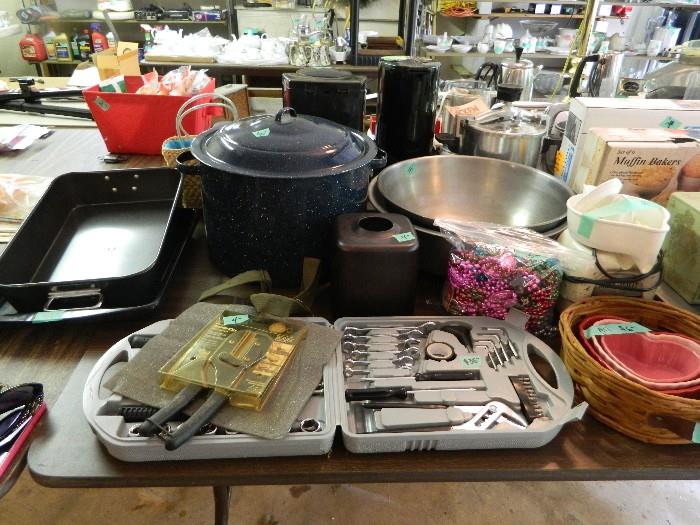 broiler pan, large enamel ware pot with lid, stainless pans, tool kit, more baskets, juicer. 