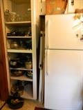 Kitchen: more cookware, bowls, cookie sheets, pizza pan - refrigerator stays with the house. 