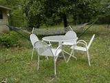 Table with 4 matching chairs. Hammock stand