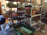 Storage Building - old sink shelves, garden cart, more dishes, lamp
