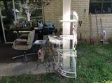 Patio - several plant stands, flower pots, and corner wrought iron shelf - could be used inside or out