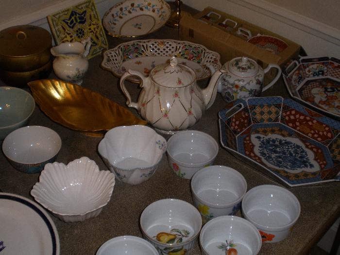 Tea pots and serving pieces.