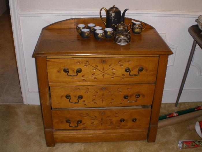 East lake chest and oriental tea set.