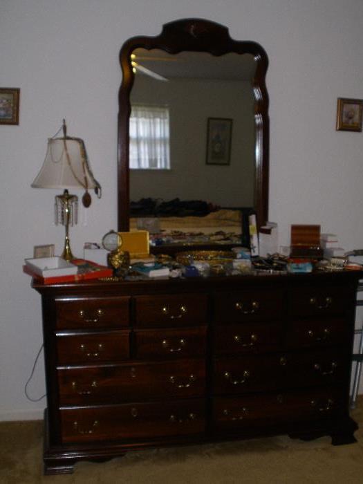 Beautiful solid wood dresser with mirror.