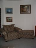 comfortable chair & ottoman and windberg prints