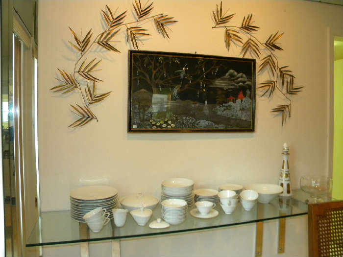 Jack Mott designed chrome wall shelf and Italian bamboo wall hangings
"Apart" china by Hutschenreuther
1920's painting