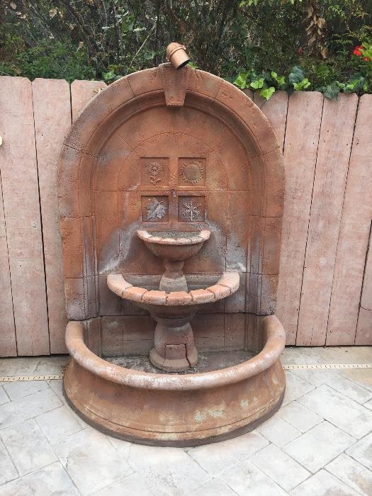 Composite and terra cotta fountain.  comes apart in pieces.  