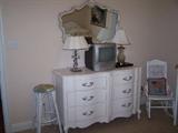 French style dresser, old rocker painted in white, lamps..