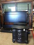Pottery Barn King size black four poster bed.
Pair of matching night stand