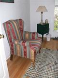 Wing back chair & green antique smoking stand