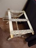 Vintage suitcase stand with tapestry
