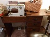 Sewing machine and cabinet