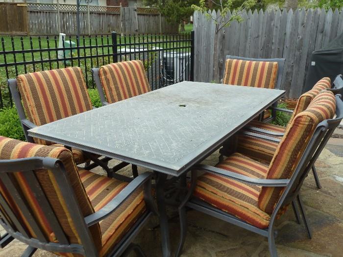 Patio set with 6 chairs with custom made cushions