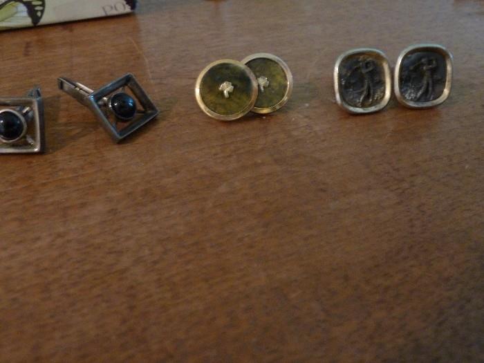 Cuff links - one is Golf