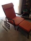 Mid Century Modern Lounge chair with ottoman, cool pierced wood magazine rack