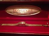 Vintage 1960s French Longines Swiss Movement watch 14k gold, in original red box. Works! Has cover over crystal that lifts to reveal face. See second photo.