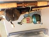 Old fishing poles and reels