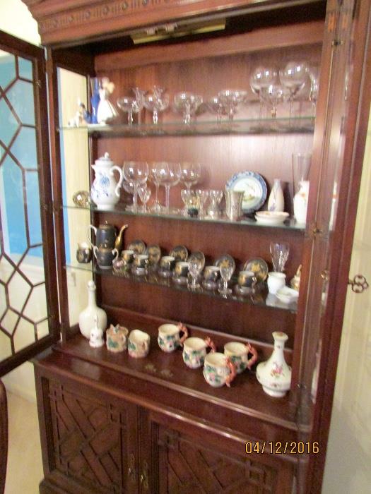 Henrendon Chinese Chippendale style light up china cabinet full of lovely items