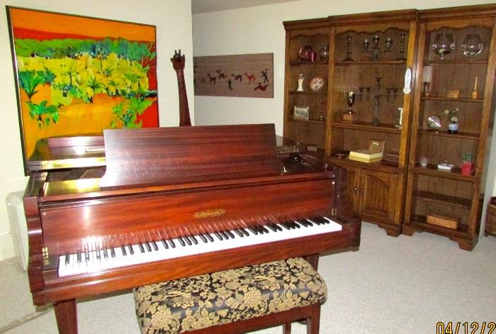 Beautiful Baby grand piano, original art, carved giraffe, sectional shelving packed with goodies