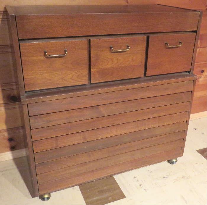 Mid-century modern solid walnut gentlemen's chest on casters manufactured by American of Martinsville, Dania collection. Designed by Merton Gershun.
