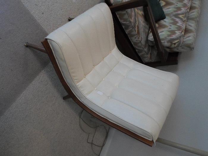 Retro vinyl scoop chair, likely by Carter