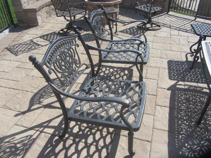 Cast aluminum table and chairs comes with cushions