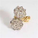 Lot# 1008 A pair of rose-cut diamond and 14K two-tone gold floral earrings 









The lever-back earrings set with 18 rose-cut diamonds totaling approximately 1.50 cts, graded M-N color and SI-I clarity. est:$500/700