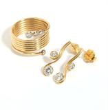 Lot# 1010 A collection of diamond and 14K yellow gold jewelry 









Tested 14K, set with 8 full-cut diamonds totaling approximately 0.50 cts. 1981 Vogue cover included, size 3.25. 4.6 gms. est:$300/500