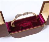 Lot# 1013 A Victorian gold and diamond serpent bangle 









A Victorian 14K yellow gold and diamond coiled serpent bangle, set with rose-cut diamonds and gem-set eyes in a fitted box, 6.75''. est:$1000/1500