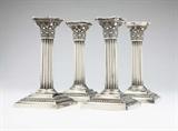 Lot# 1044 A set of four sterling silver candlesticks, Gorham 









Early 20th century, each with maker's marks, each further marked ''Sterling'' and ''A3204'', modeled as fluted columns with Corinthian capitals on beaded square bases, with removable nozzles, weighted, 4 pcs, gross weight 48.2 oz troy approximately, each. 6.25'' H x 3.25'' W x 3.25'' D. est:$500/700