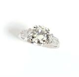 Lot# 1060 An Art Deco diamond and platinum ring 









Circa 1925, centering a transitional-cut round diamond weighing 1.61 cts, and graded I-J color and SI clarity, flanked by 2 marquise and 6 baguette-cut diamonds totaling 0.20 ct, size 5.75. 4 gms. est:$2500/3500