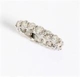Lot# 1062 A diamond and 14K white gold eternity band 









Set with 17 full-cut diamonds totaling approximately 3.40 cts, graded K-L-M color and I clarity, size 6.75. est:$1500/2000