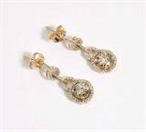 Lot# 1061 A pair of colored diamond and 14K yellow gold pendant earrings 









The diamonds totaling approximately 1.20 cts, graded light brown and I clarity, remaining set with colorless diamonds. est:$900/1200