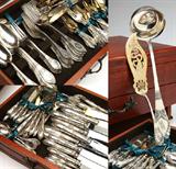 Lot# 1073 An extensive German .800 silver flatware service, Vereinigte Silberwarenfabriken, Dusseldorf 









First half 20th century, with maker's mark and crescent and crown mark, a service for eight, comprising: 8 dinner forks (8.25''), 8 luncheon forks (7''), 8 salad / fish forks (6.75''), 8 cake forks with gilt-washed tines (7''), 8 cocktail forks with gilt-washed tines (5.5''), 8 hollow handle gilt-washed-steel-tined grill forks (7.25''), 8 hollow handle gilt-washed-steel-tined bird forks (6.25''), 8 escargot forks with gilt-washed tines (4.75''), 8 ice cream forks with gilt-washed bowls (5.25''), 10 oval bowl soup spoons (7''), 8 teaspoons (5.5''), 10 teaspoons with gilt-washed bowls (5.5''), 8 demitasse spoons with gilt-washed bowls (4.25''), 8 five o'clock teaspoons with gilt-washed bowls (5''), 8 tablespoons (8.25''), 8 hollow handle steel-bladed dinner knives (9.75''), 8 hollow handle steel-bladed luncheon knives (8.25''), 8 hollow handle gilt-washed-steel-bladed luncheon