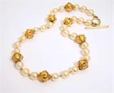 Lot# 1088 A cultured pearl, ruby and 18K yellow gold necklace 









Tested 18K, with 18K yellow gold toggle, the pearls measuring approximately 8.00 mm, 16''. est:$2000/3000