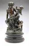 Lot# 1106 After Clodion, a French patinated bronze figural group 









19th century, the base inscribed ''Clodion'', depicting a satyress (female satyr) holding two cherubs, on an integral naturalistic base, mounted on a circular wooden plinth, overall. 18.5'' H x 10'' Dia. est:$1500/2500
