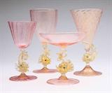 Lot# 1119 A Venetian pink and gold glass stemware service 









Late 19th / early 20th century, with dolphin-form stems and fragmented gold leaf decoration, a partial service comprising: 12 clarets (7.25'' H), 8 small wine glasses (6.25'' H), 5 sherries (6'' H), 6 water goblets (7.5'' H), and 12 sherbets (4.75''), 43 pcs. est:$2000/3000