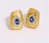 Lot# 1127 A pair of sapphire and diamond earrings 









18K two-tone gold earrings centering an oval sapphire totaling approximately 2.20 cts, accented with white gold and 56 full-cut diamonds totaling approximately 0.30 cts, graded H-I color and VS clarity, 17.3 gms. est:$3000/5000