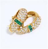 Lot# 1126 A pair of emerald, diamond and 18K yellow gold earrings, Hammerman Bros 









Stamped ''HB'' (Hammerman Brothers), set with 46 full-cut diamonds totaling approximately 1.50 cts, graded H-I color and VS clarity with emerald accents, 11.6 gms. est:$1800/2250