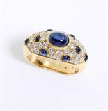 Lot# 1135 A sapphire cabochon, diamond and 18K yellow gold ring, attributed to Cartier 









Set with 36 full-cut diamonds totaling approximately 0.80 ct, graded G-H color and VS clarity, size 5, 6.7 gms. est:$3000/5000