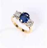 Lot# 1137 A sapphire and diamond ring 









14K yellow gold, centering an oval sapphire weighing approximately 2.50 cts with 2 round brilliant-cut diamond shoulders totaling approximately 1.45 cts, graded G-H color and VS-SI clarity, size 6.25. est:$3000/5000