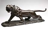 Lot# 1152 A Japanese patinated bronze model of a tiger 









Meiji period (1868 - 1912), marked to underside of body with Japanese characters within an oval, modeled as a prowling tiger, with a naturalistically carved wooden plinth, overall. 13'' H x 33.5'' W x 9'' D. est:$1000/1500