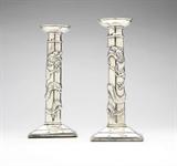 Lot# 1149 A pair of Chinese export silver candlesticks, Wang Hing, Hong Kong 









Late 19th / early 20th century, each bearing ''WH90'' mark and a Chinese character mark on nozzles, the circular removable nozzles over dragon-decorated stems, on stepped square bases, weighted, 2 pcs, gross weight 27.8 oz troy tw approximately, each. 8'' H x 3.5'' W x 3.5'' D. est:$600/900