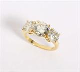 Lot# 1162 A three-stone diamond and 18K yellow gold ring 









The central diamond with GIA report #12138138 dated July 31, 2002, stating round brilliant-cut 1.99 cts, J color, VS1 clarity, no fluorescence, with two round brilliant-cut sides weighing approximately 0.95 ct each, both graded J-K color and SI clarity, size 4.75. est:$10,000/15,000