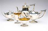 Lot# 1200 A five-piece sterling silver tea / coffee service, Gorham ''Plymouth'' 









1958 - 1961, with makers mark and various date marks, an assembled part service comprising: a teapot (7'' H x 12'' W x 5'' D), a coffee pot (9'' H x 11'' W x 5'' D), a milk jug with gilt-washed interior (6.75'' H x 5.75'' W x 3'' D), a covered sugar bowl (5'' H x 8'' W x 4.5'' D), and a waste bowl with gilt-washed interior (3.75'' H x 5.5'' W x 3.75'' D), 5 pcs, 69.9 oz troy tw approximately. est:$1500/2500