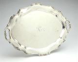 Lot# 1197 A sterling silver double-handled tray, Reed and Barton ''Hampton court'' 









Dated 1957, with makers mark, further marked ''Sterling'' and ''661'', of oval outline with C-scroll-decorated edges, monogrammed to center ''R''. 25'' H x 17.5'' W, 102.5 oz troy approximately. est:$2500/3500