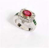 Lot# 1057 A red spinel, tsavorite, and diamond ring 









The oval red spinel set in a yellow gold bezel with a diamond surround and square-cut green tsavorite shoulders with diamond side accents, the spinel measuring 8 x 6 mm, weighing approximately 1.65 ct, set with 20 full-cut diamonds totaling approximately 0.40 ct, graded H-I color and SI clarity, size 7, 10.2 gms. est:$6500/7500