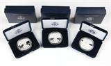 Lot# 1149 Group lot, three American Eagle One Ounce Proof Silver Dollar Coins. One 2011, Two 2010
, est:$100/150