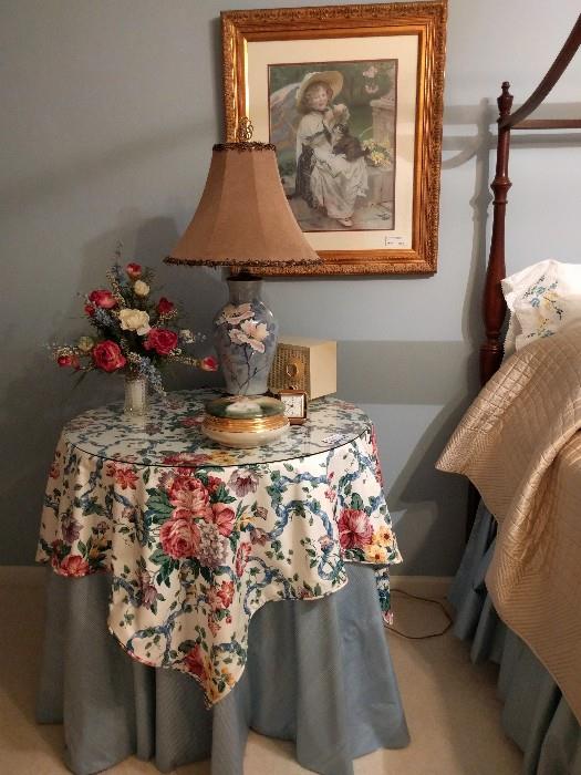 Here's a snippet of the florabunda fabric, that drowns this room. I do like the hand-painted porcelain lamps and yes, there's a pair of them.