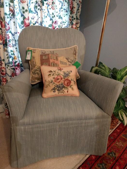 Sweet little slipper chair that escaped the enrobement of floral ipecac. Nice needlepointed pillows.